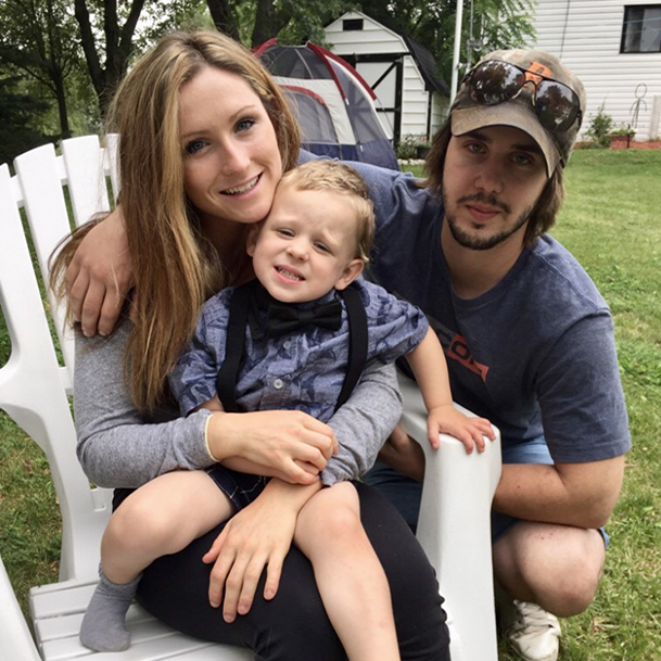 Meghan, Conner, and their kid Myles outside 